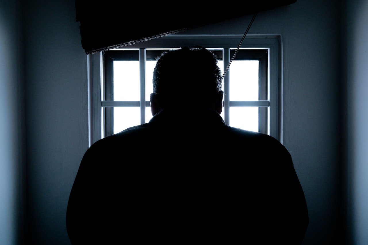 person in jail silhouette