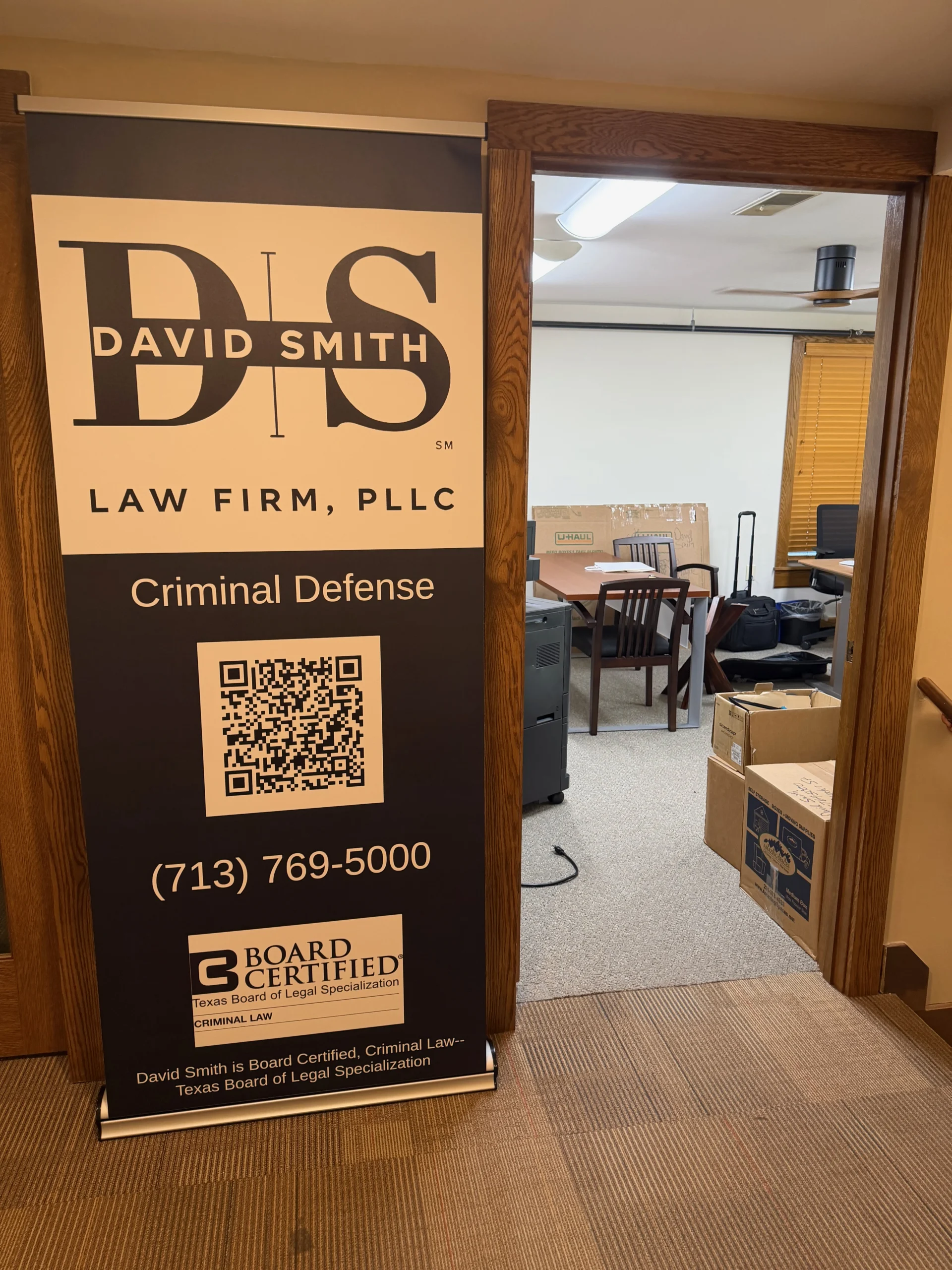 A sign on the side of the room