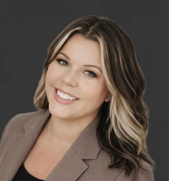 A woman smiling for the camera
